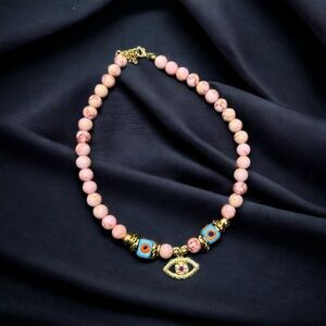 Elegant Baby Pink Beaded Necklace with Gold Accents